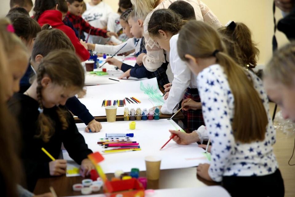 Children painting (placeholder)